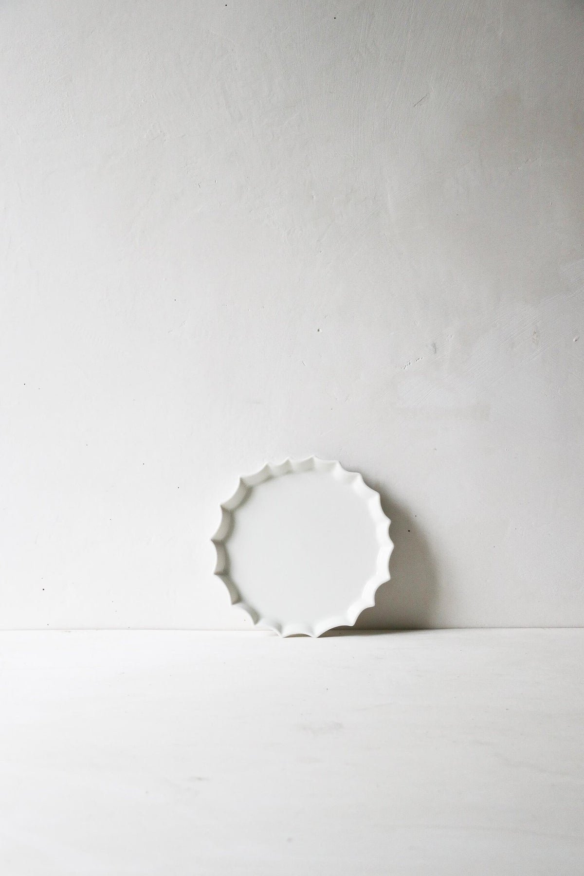 Assiette en porcelaine Canelé
