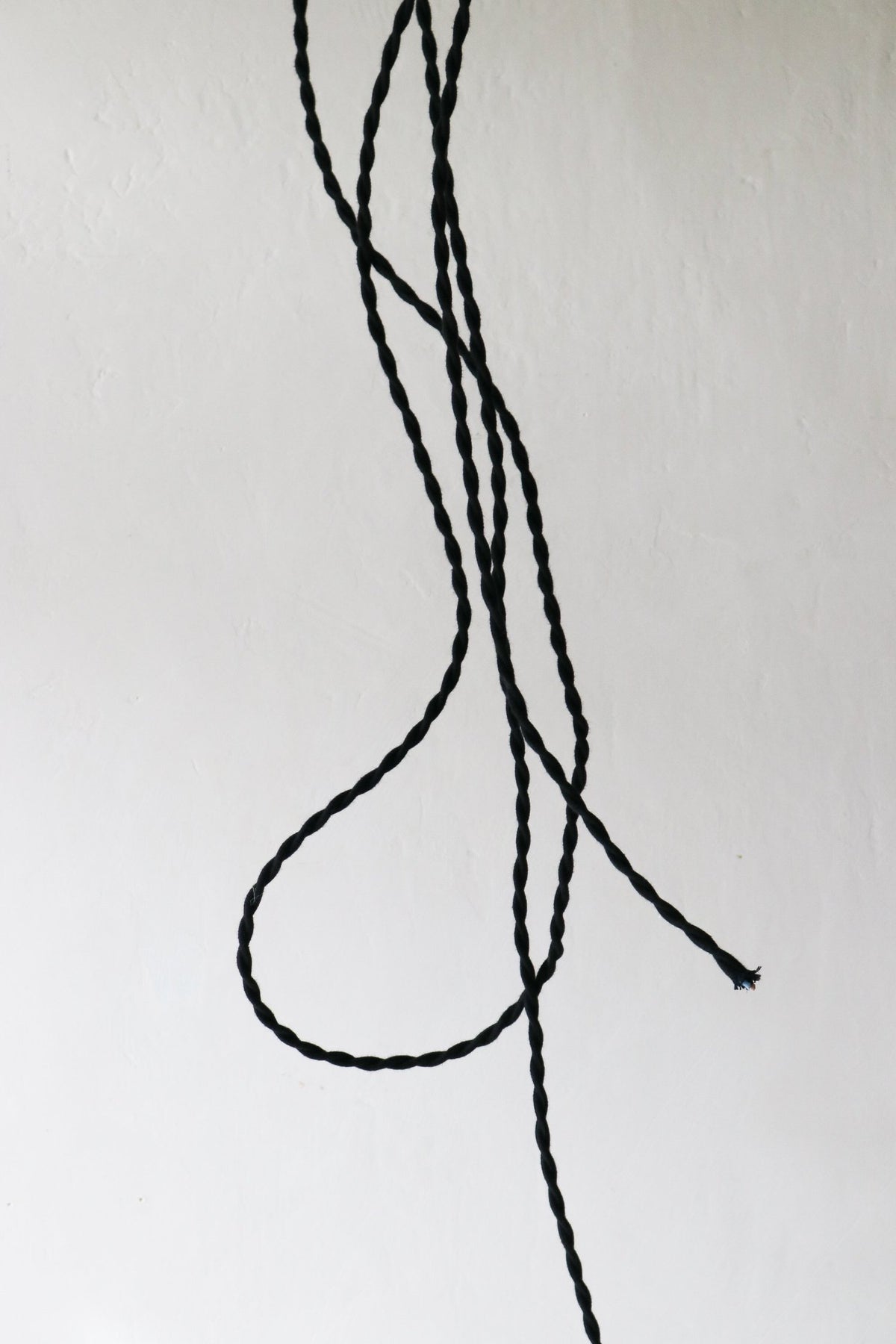 Câble électrique fil noir tressé