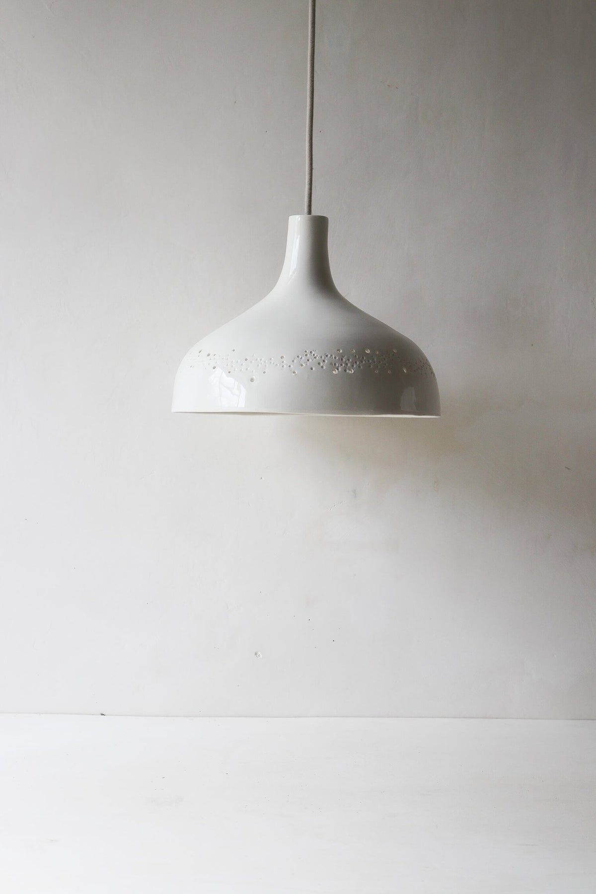 Suspension en porcelaine Point