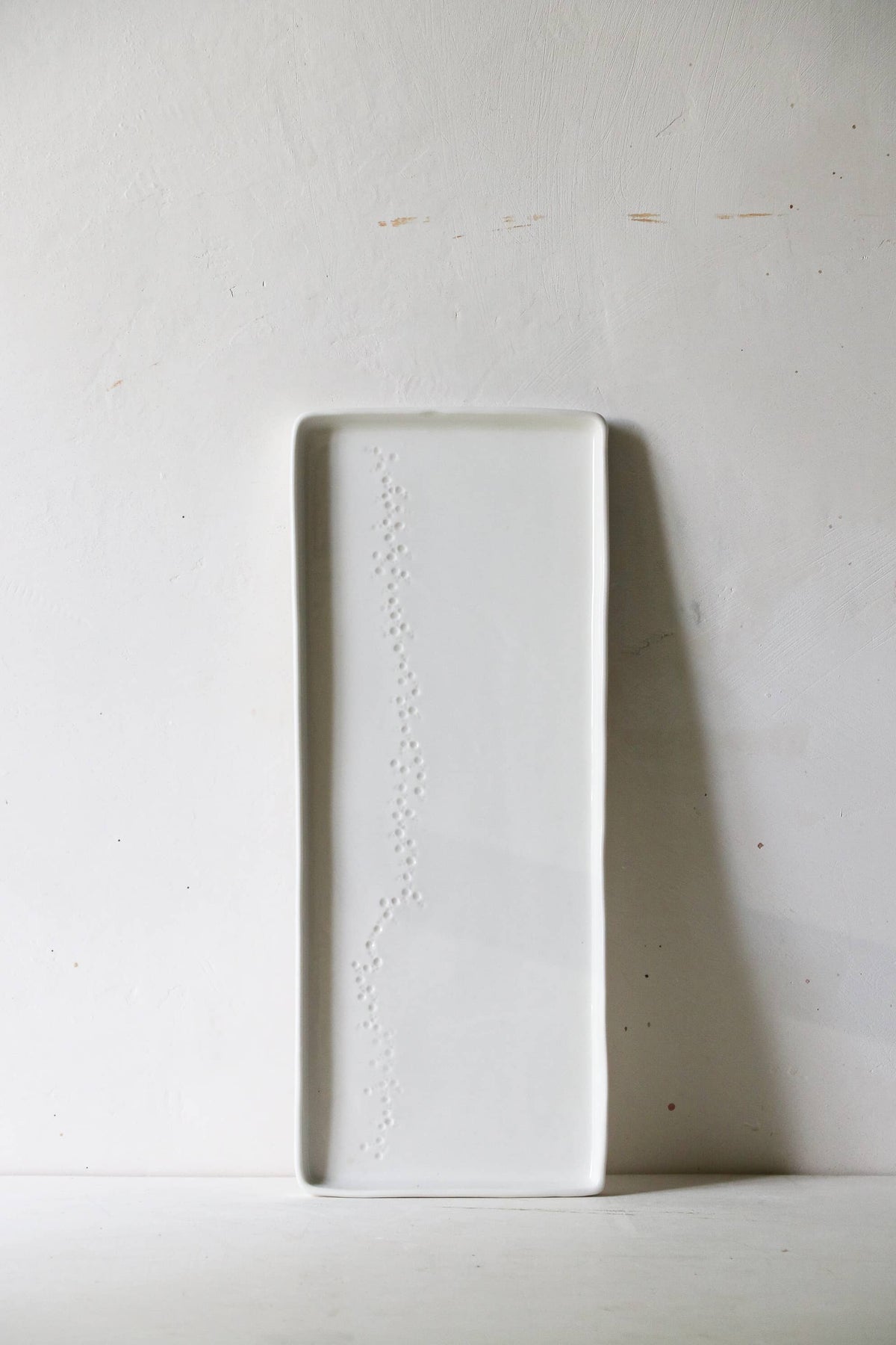Plat à cake en porcelaine Point